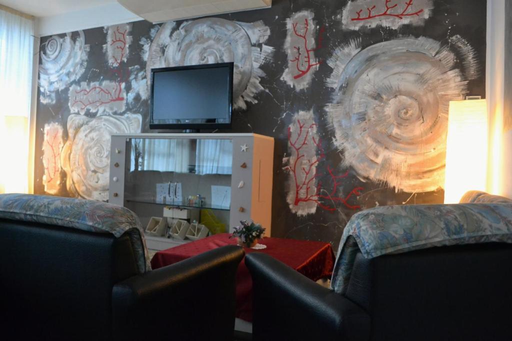 TV a/nebo společenská místnost v ubytování Hotel Solmar