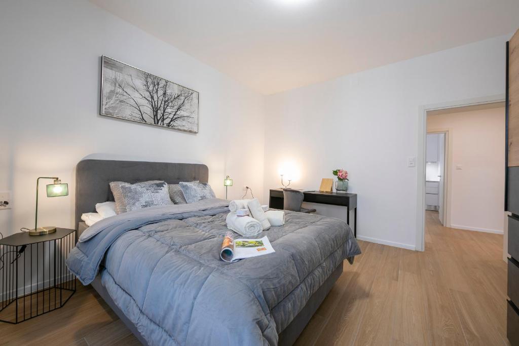 Postel nebo postele na pokoji v ubytování Boutique Apartments