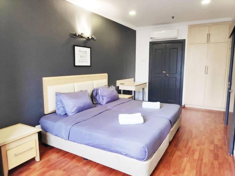 Giường trong phòng chung tại Eco One Bedroom Apartment @ Jalan Ampang, 3 pax