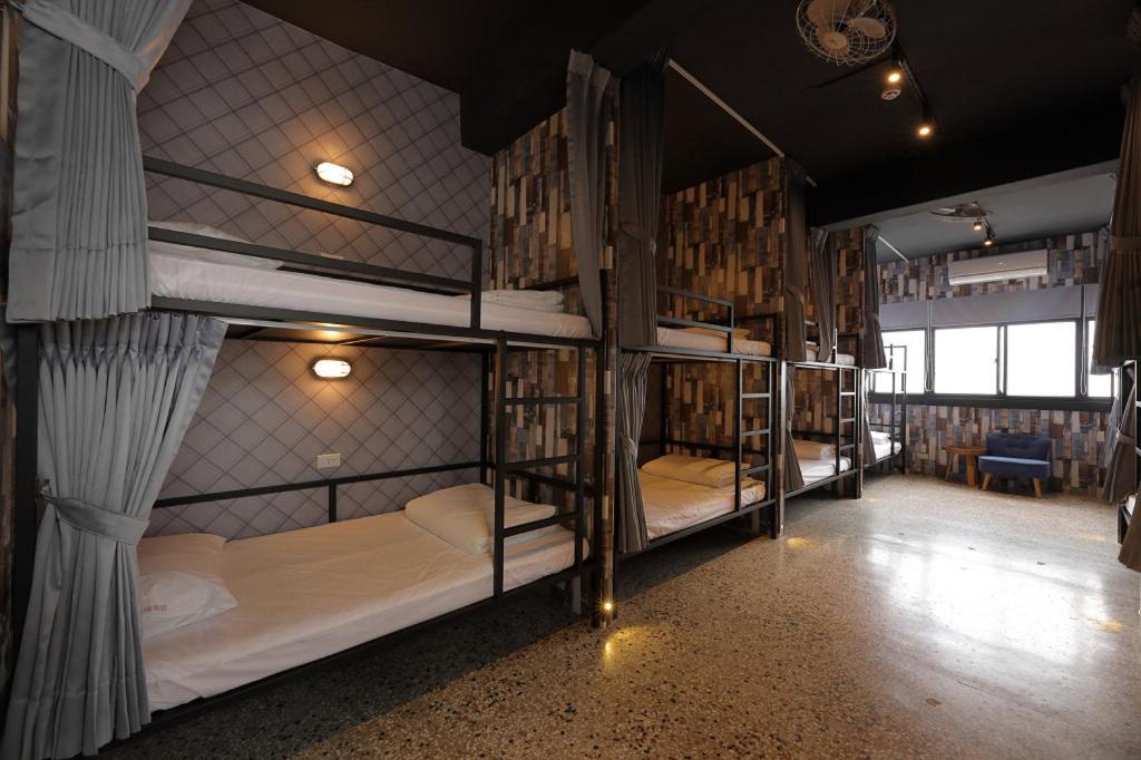 Postel nebo postele na pokoji v ubytování Topbunk Hostel