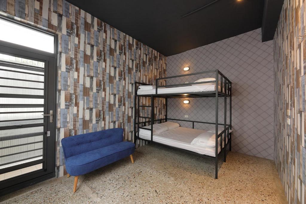 Postel nebo postele na pokoji v ubytování Topbunk Hostel