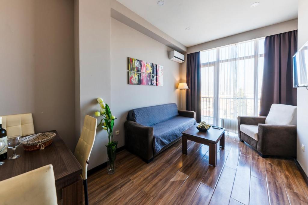 Posezení v ubytování Sani Apart Hotel