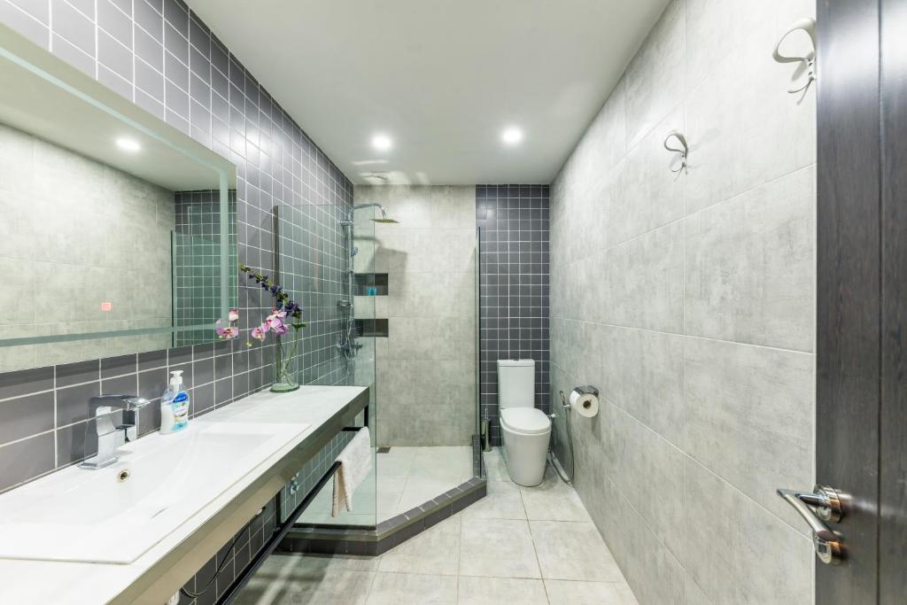 Koupelna v ubytování Sani Apart Hotel