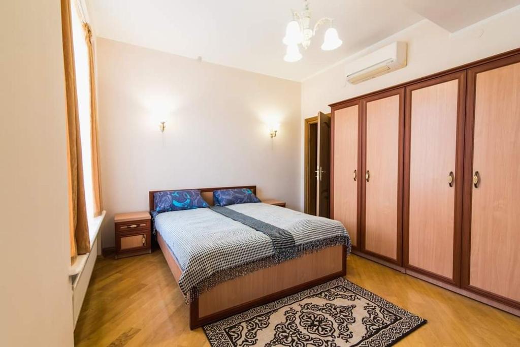 Postel nebo postele na pokoji v ubytování Koncha-Zaspa Spa Hotel