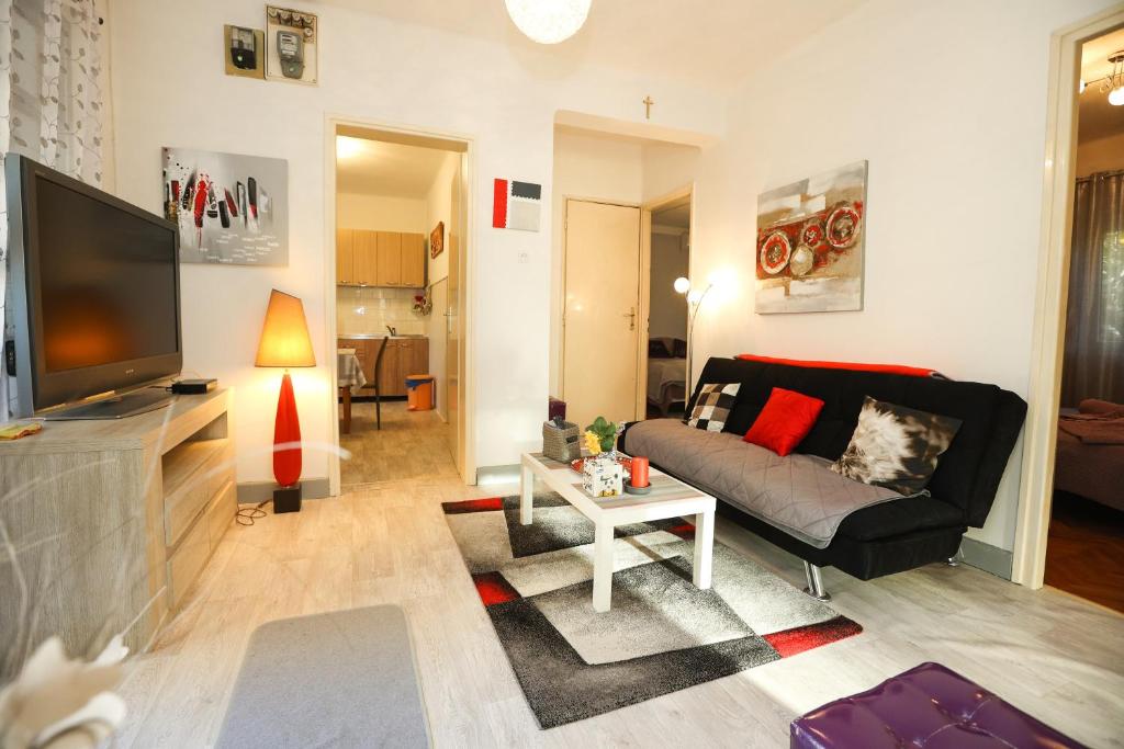 TV a/nebo společenská místnost v ubytování Holiday Home Bura