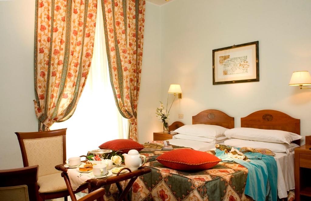 Postel nebo postele na pokoji v ubytování Hotel Aberdeen