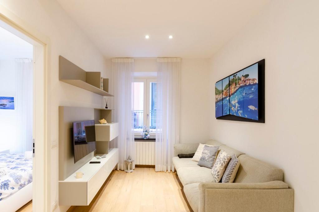 Televízia a/alebo spoločenská miestnosť v ubytovaní Appartamento di design