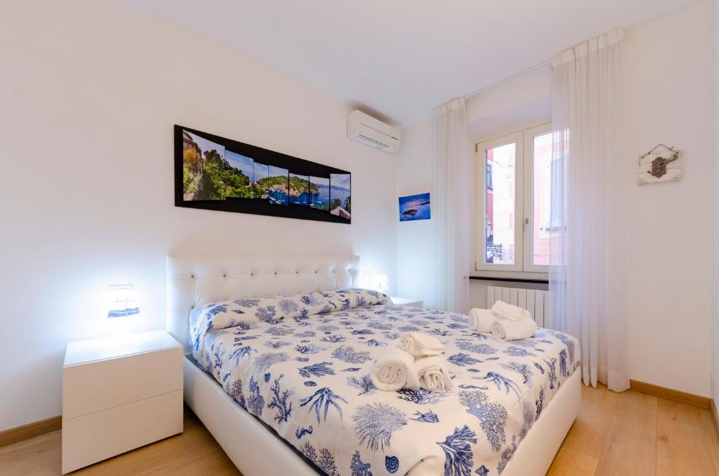 Posteľ alebo postele v izbe v ubytovaní Appartamento di design