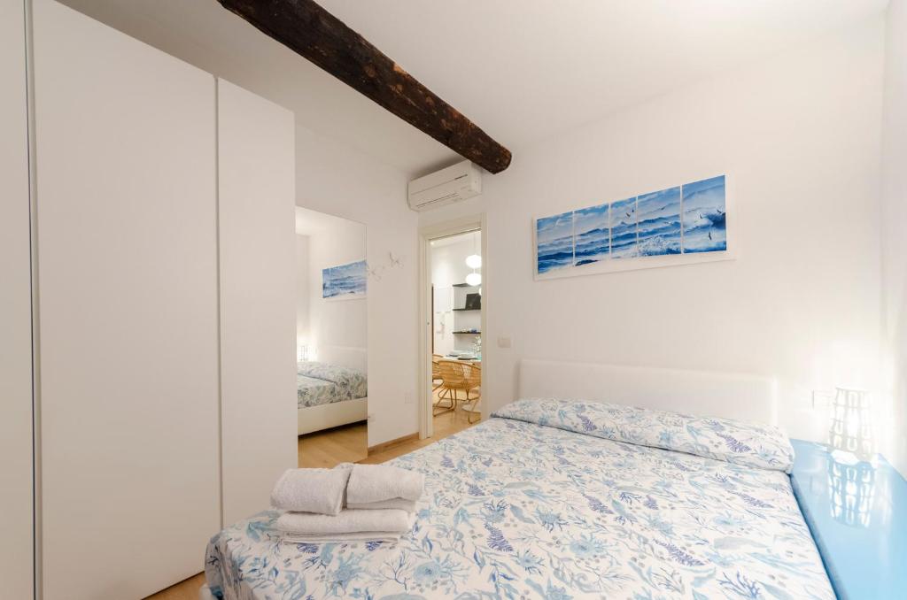 Posteľ alebo postele v izbe v ubytovaní Appartamento di design