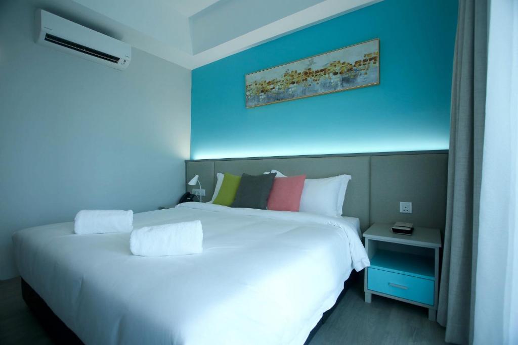 Postel nebo postele na pokoji v ubytování Stanton City Hotel