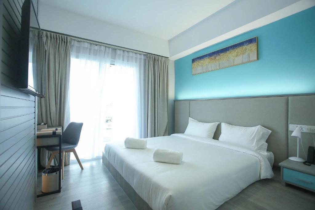 Postel nebo postele na pokoji v ubytování Stanton City Hotel
