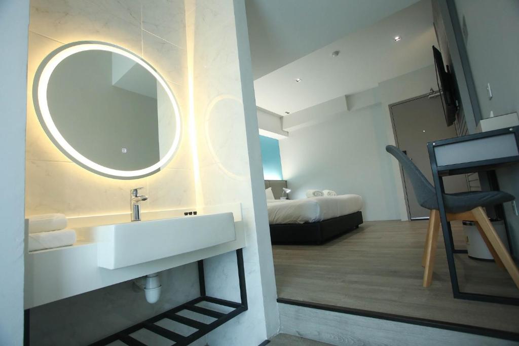 Postel nebo postele na pokoji v ubytování Stanton City Hotel