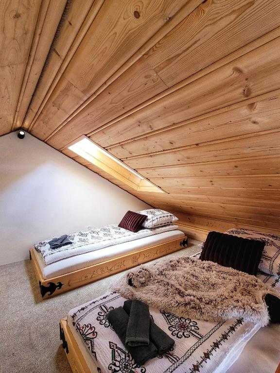 Posteľ alebo postele v izbe v ubytovaní Podhalańska Ostoja Apartament