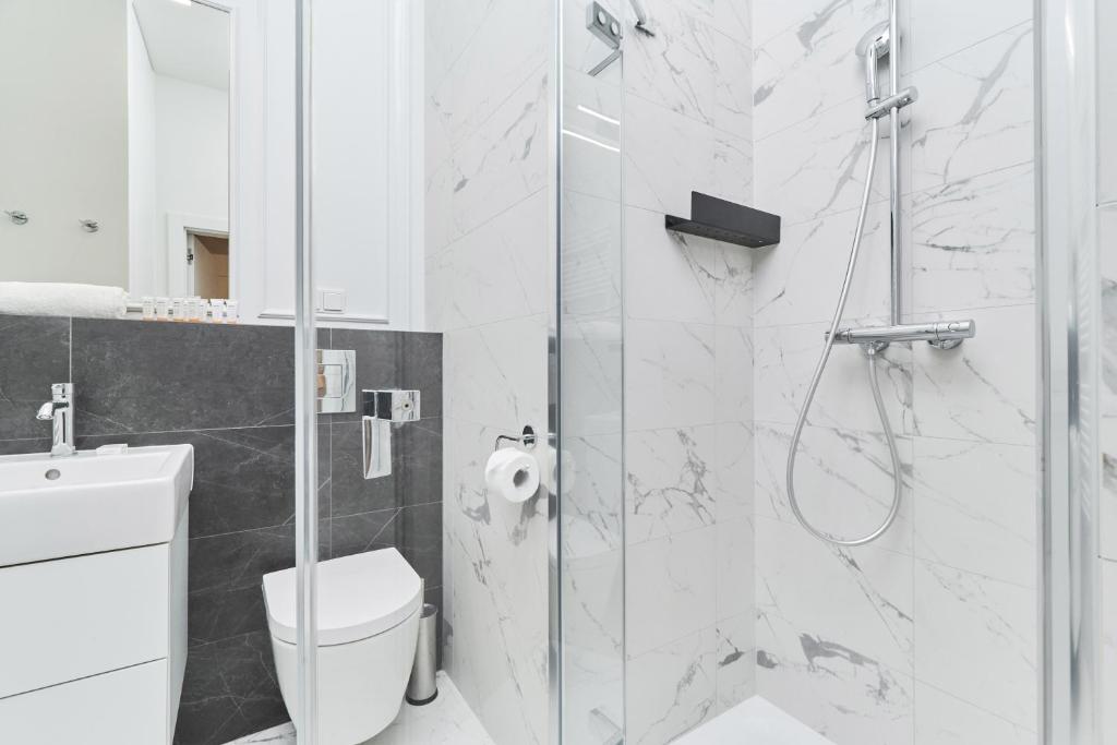 Kúpeľňa v ubytovaní Apartments Młyn Maria Wrocław by Noclegi Renters