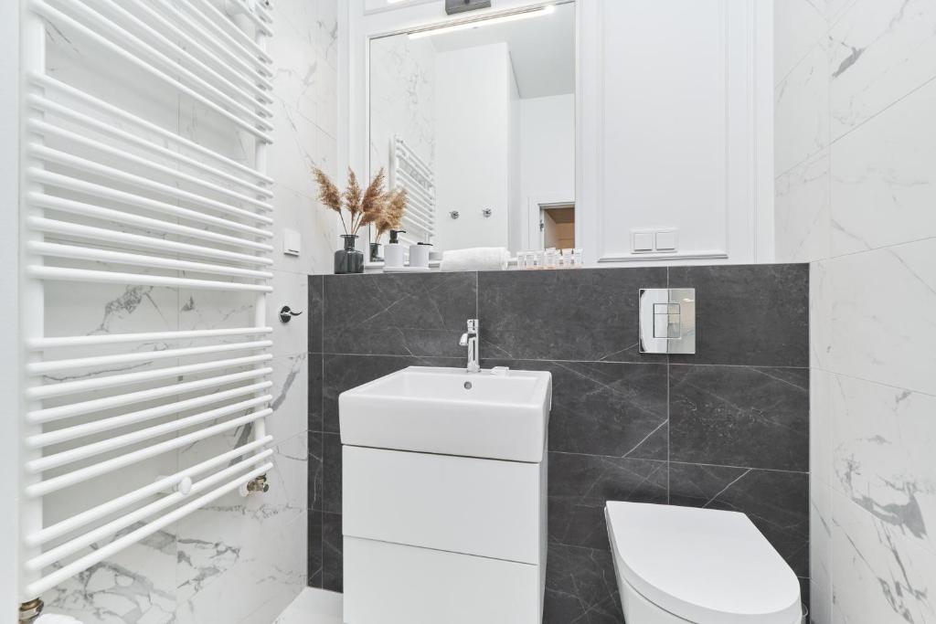 Kúpeľňa v ubytovaní Apartments Młyn Maria Wrocław by Noclegi Renters