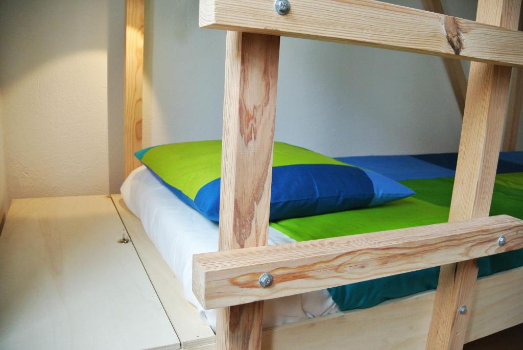 Postel nebo postele na pokoji v ubytování Nazaré Hostel - Rooms & Dorms