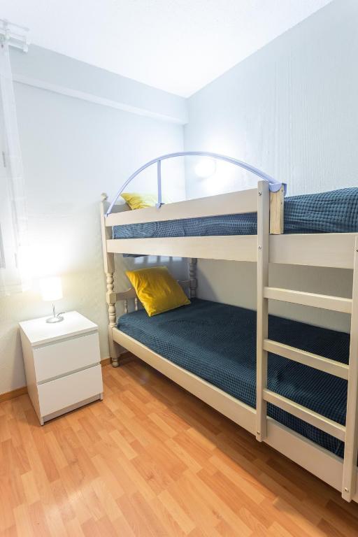 Postel nebo postele na pokoji v ubytování Grizzli Pedrous
