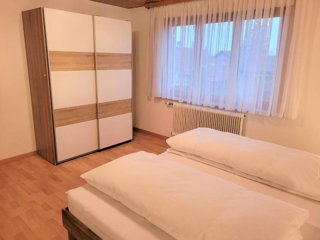 Postel nebo postele na pokoji v ubytování Ferienhaus Hämmerle´s