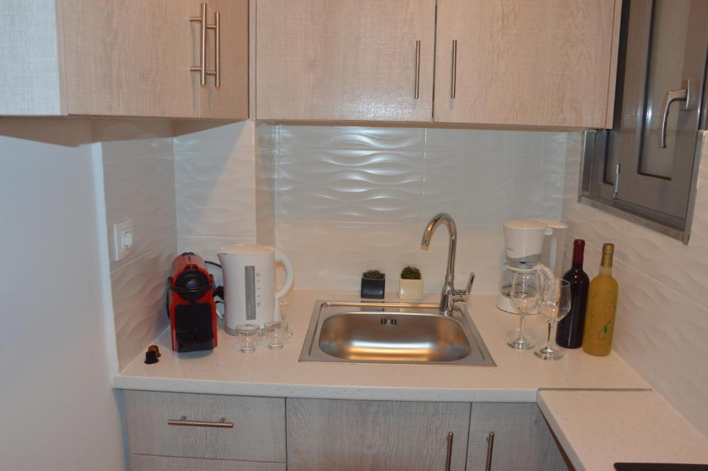 Kuchyňa alebo kuchynka v ubytovaní Cozy and comfortable apartment in Athens Center
