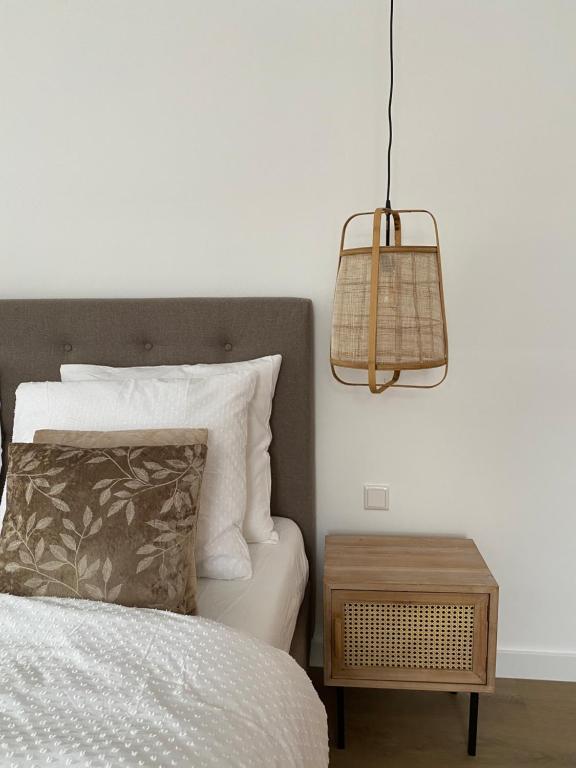 Postel nebo postele na pokoji v ubytování LOFT15