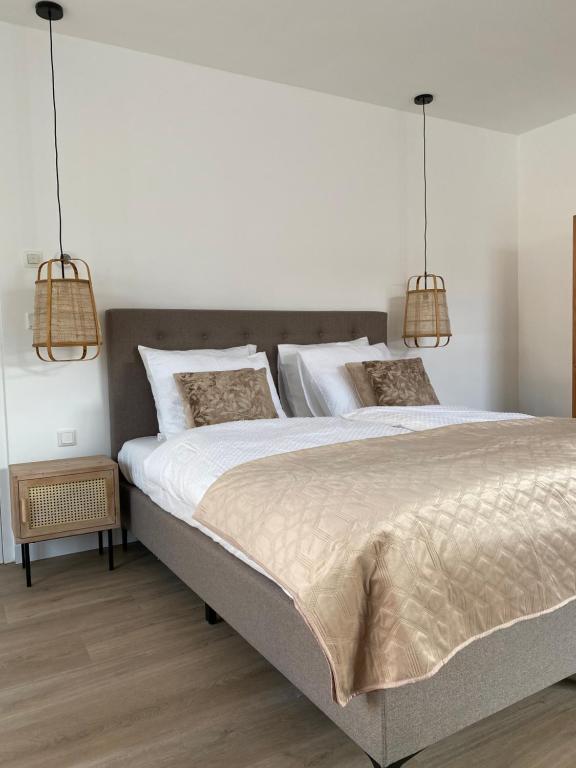 Postel nebo postele na pokoji v ubytování LOFT15