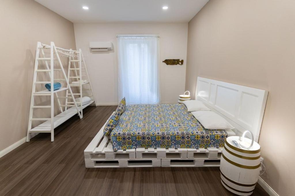 Posteľ alebo postele v izbe v ubytovaní Sikelia-sicilian rooms