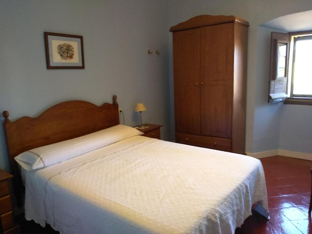Postel nebo postele na pokoji v ubytování Casa Rural El Granero