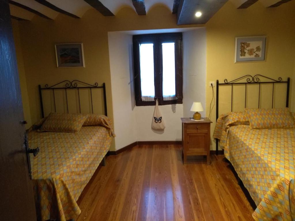Postel nebo postele na pokoji v ubytování Casa Rural El Granero