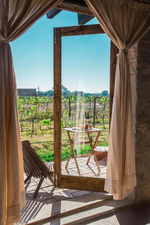 Balkón nebo terasa v ubytování Hotel de Tierra Viñedo y Spa - Aeropuerto Querétaro