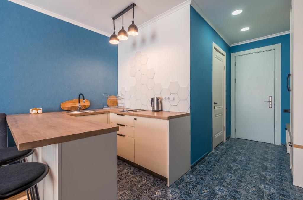 Kuchyň nebo kuchyňský kout v ubytování New Gudauri Atrium apartment #514