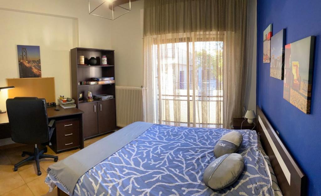 Postel nebo postele na pokoji v ubytování Karras' Home