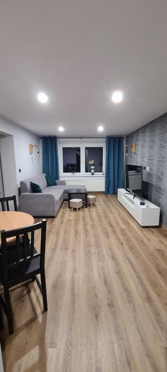 Posteľ alebo postele v izbe v ubytovaní Orlicka Apartament