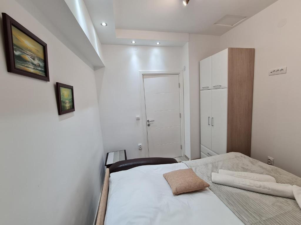 Postel nebo postele na pokoji v ubytování "Astor16" Apartments