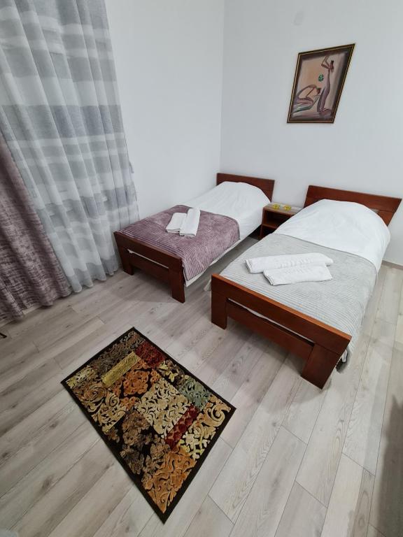 Postel nebo postele na pokoji v ubytování "Astor16" Apartments