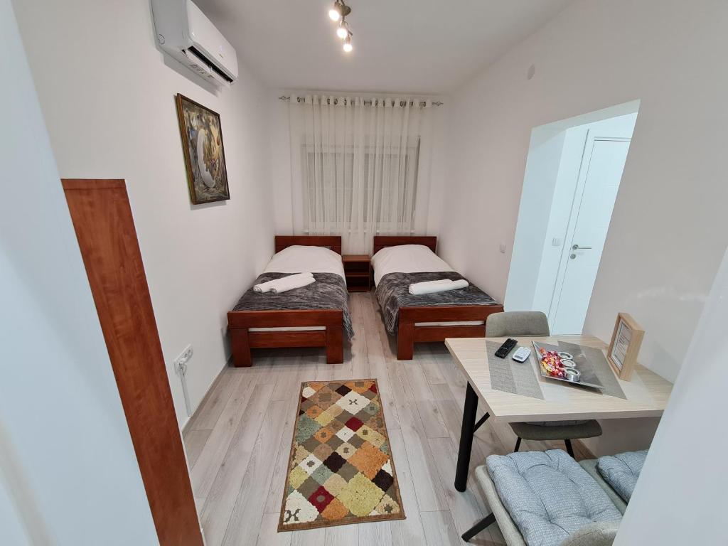 Postel nebo postele na pokoji v ubytování "Astor16" Apartments