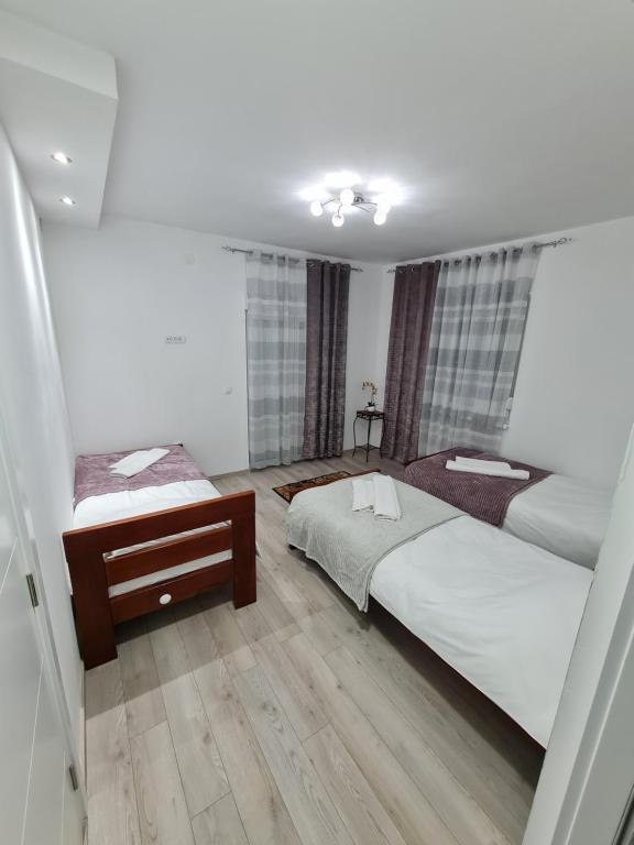 Postel nebo postele na pokoji v ubytování "Astor16" Apartments