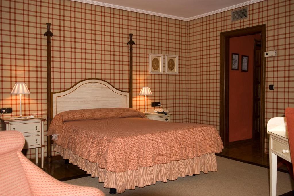 Cama o camas de una habitación en Hotel Presa