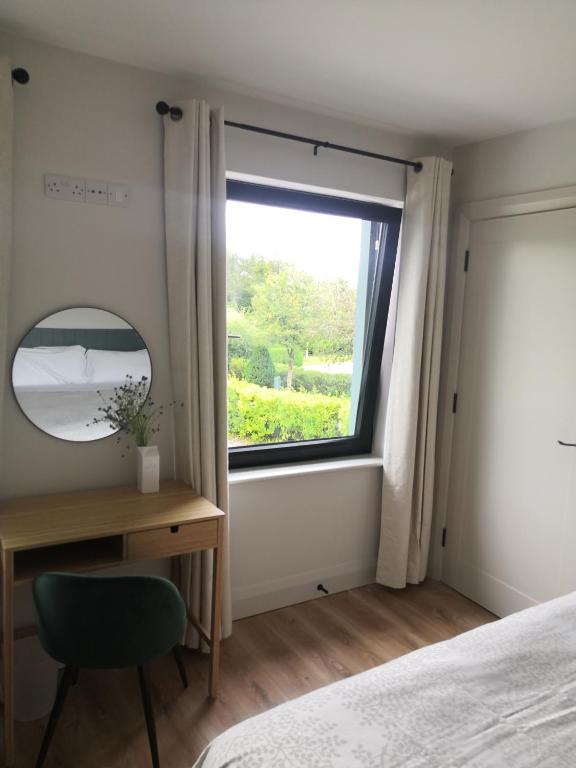 Postel nebo postele na pokoji v ubytování Cedar Lodge