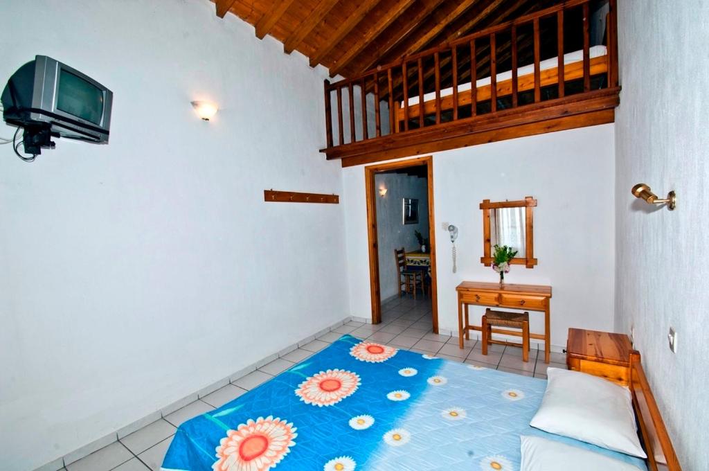 Postel nebo postele na pokoji v ubytování Athina Apartments