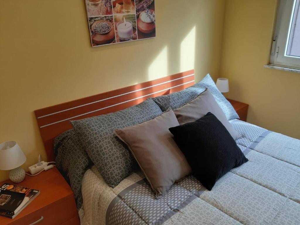 A bed or beds in a room at Apartamento Puerto de Foz