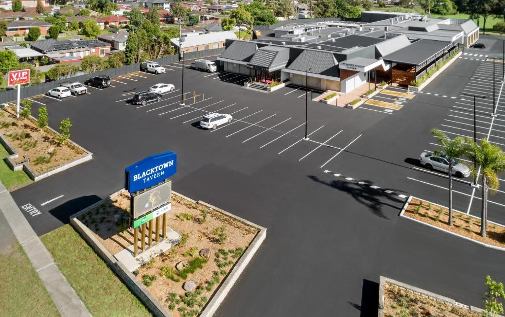 an overhead view of a parking lot with cars parked at Blacktown Tavern in Blacktown