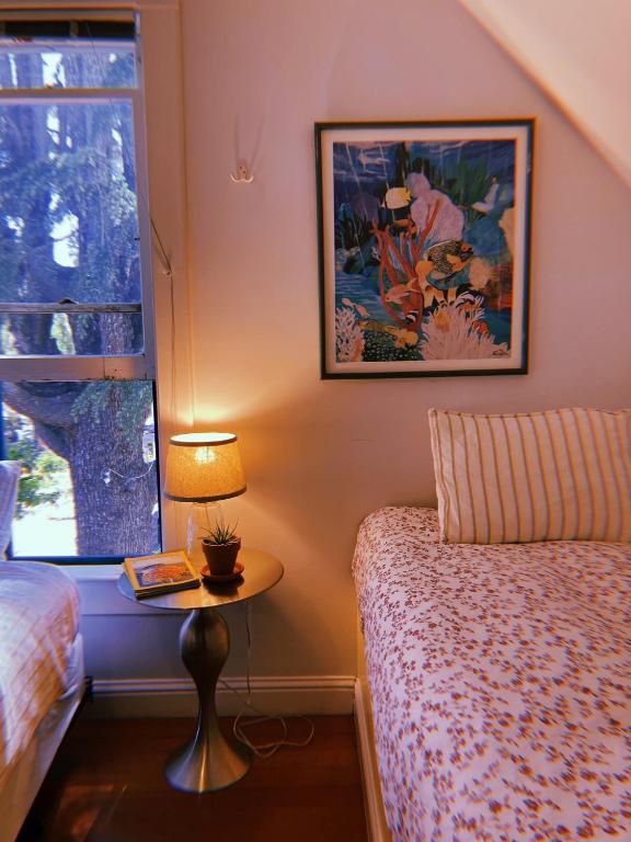 Postel nebo postele na pokoji v ubytování Santa Cruz Hostel
