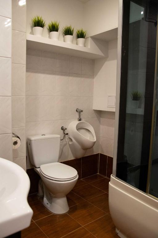 Kúpeľňa v ubytovaní Dom na Wynajem - Bartoszówka