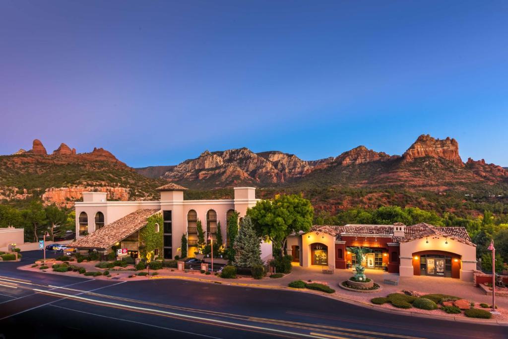 a rendering of a hotel with mountains in the background at Best Western Plus Arroyo Roble Hotel & Creekside Villas in Sedona
