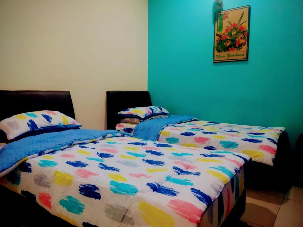Postel nebo postele na pokoji v ubytování HMA Guesthouse