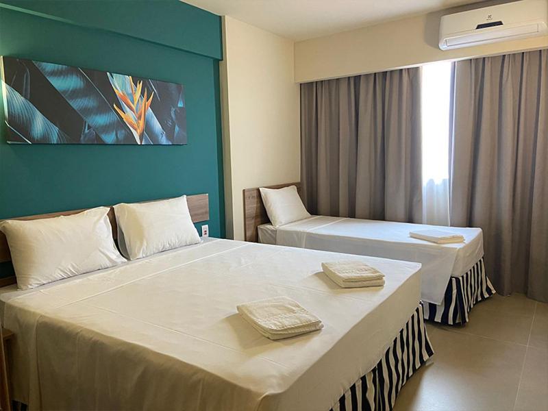Llit o llits en una habitació de Resort Olimpia Apartamento