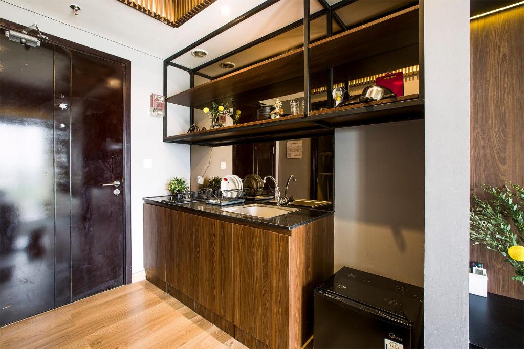 Kuchyň nebo kuchyňský kout v ubytování Futura Studio-Modern Apartment near CBD BSD