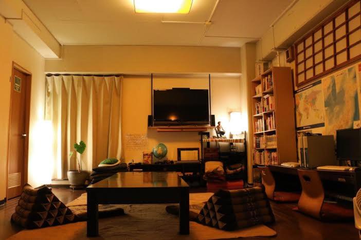 TV a/nebo společenská místnost v ubytování Green Guesthouse