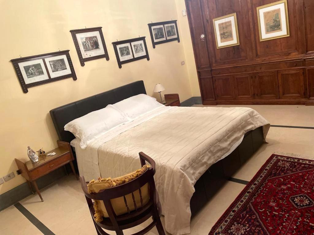 Łóżko lub łóżka w pokoju w obiekcie CESARE'S HOME