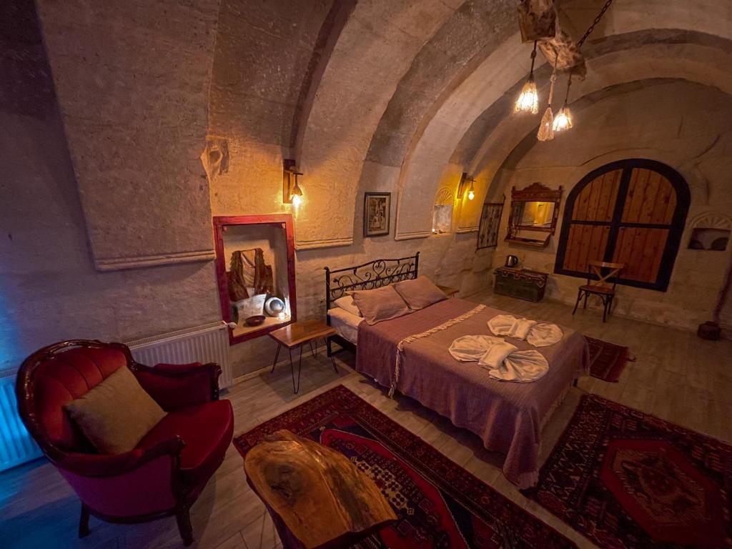 Postel nebo postele na pokoji v ubytování Zen Cappadocia